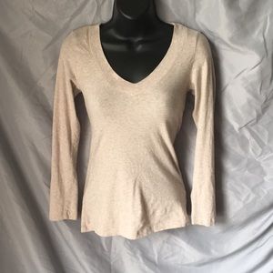 Distressed nude or beige shirt
